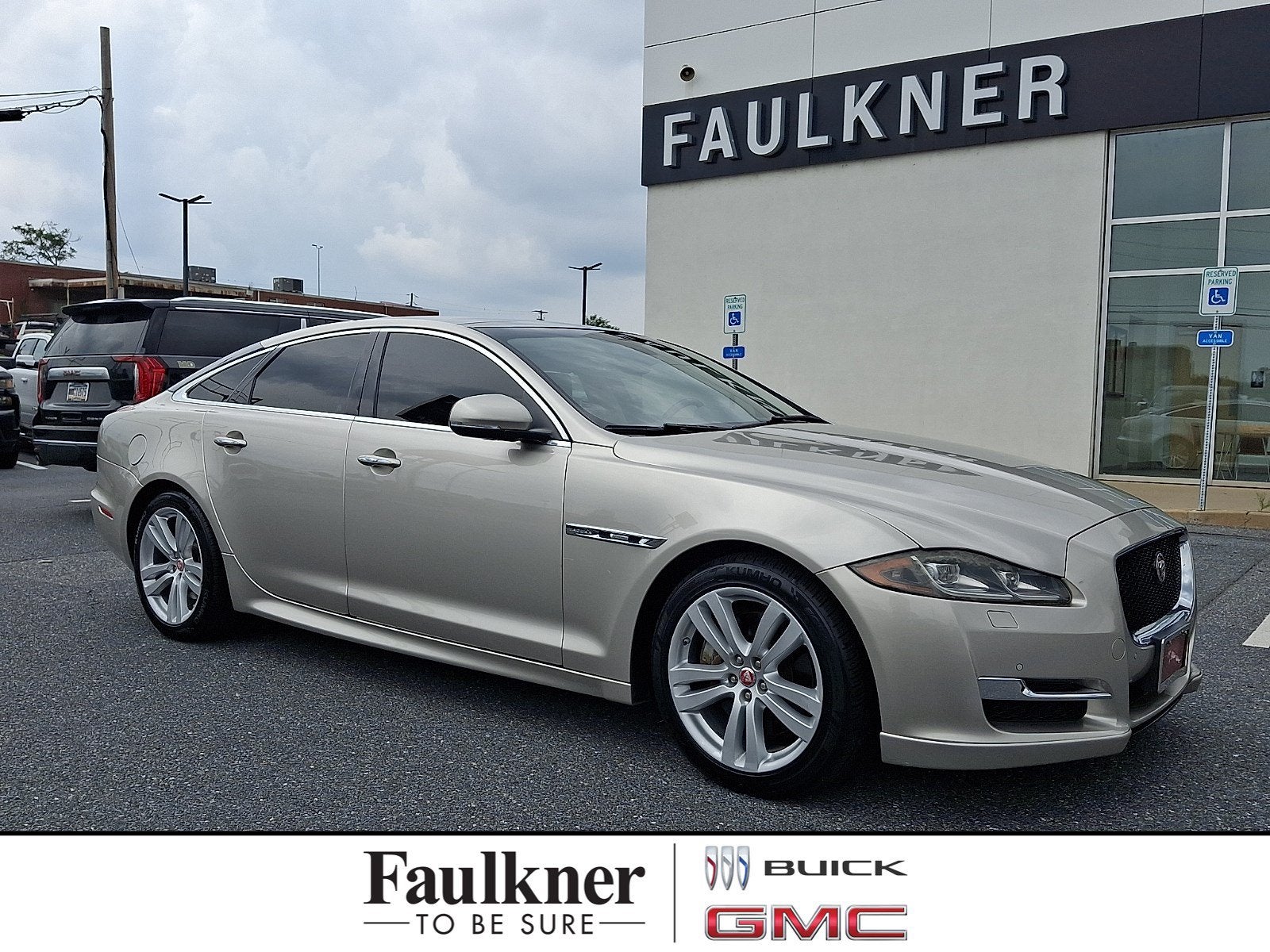 2016 Jaguar XJ R-Sport in Ingot — front three-quarter view