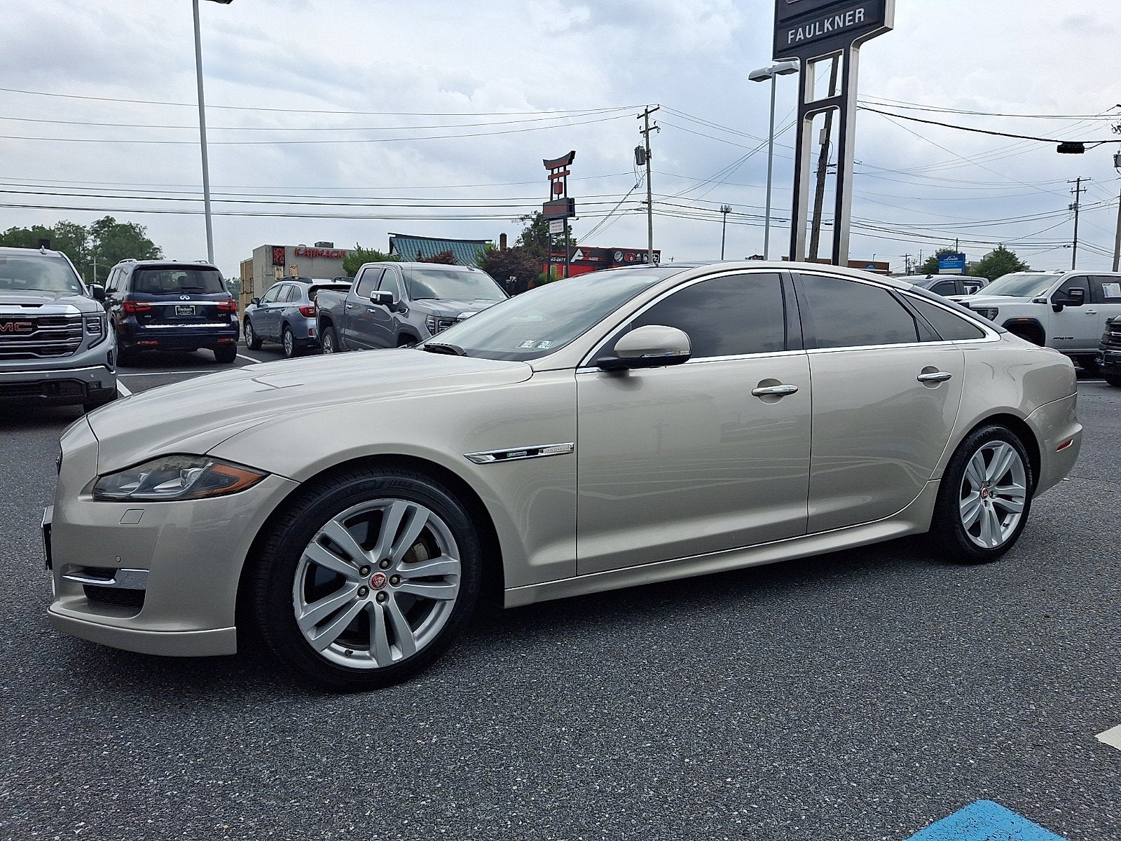 2016 Jaguar XJ — rear three-quarter view