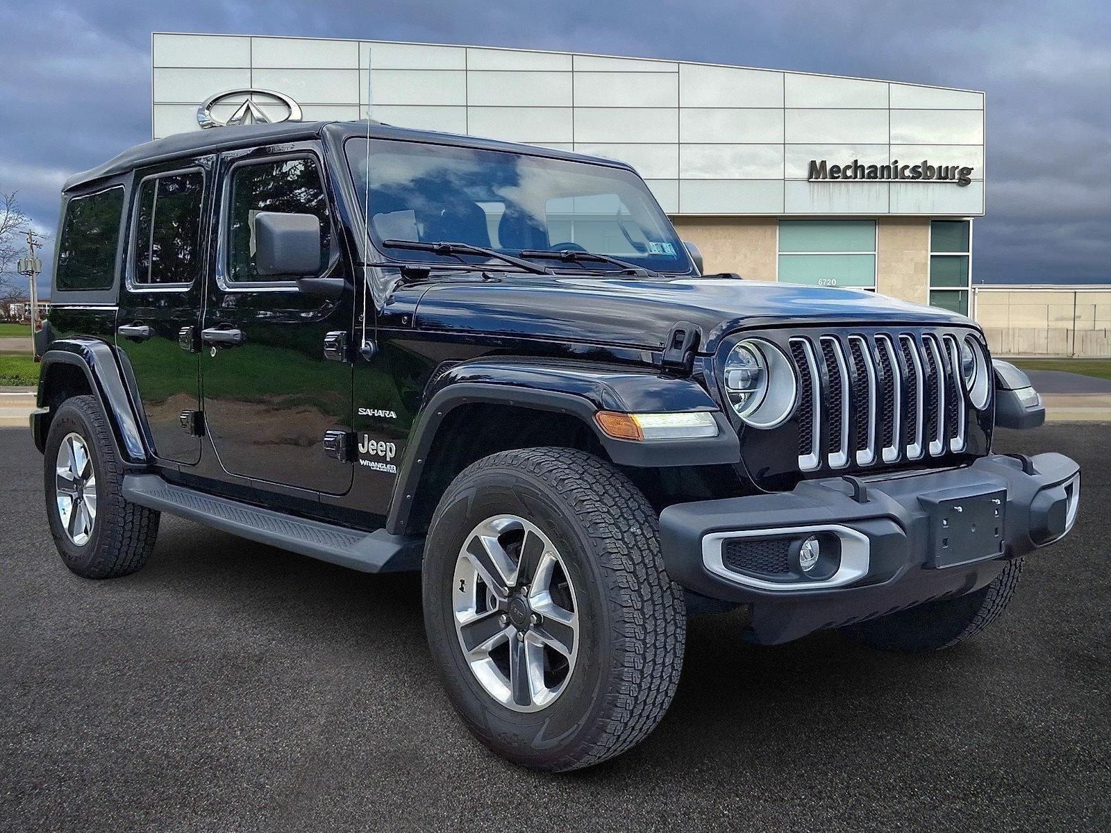 2022 Jeep Wrangler Unlimited Sahara 4x4 in Black Clearcoat — front three-quarter view