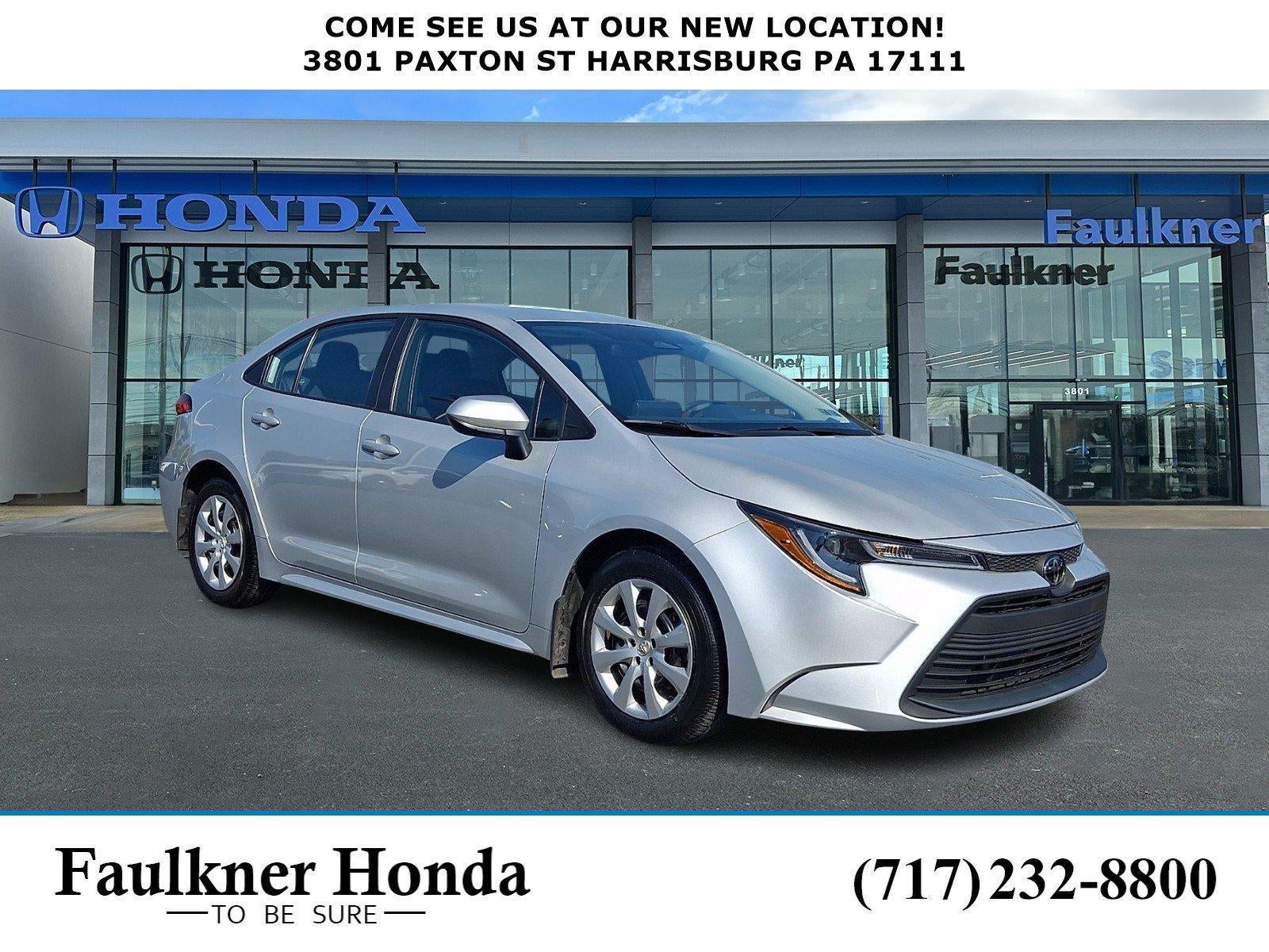 2025 Toyota Corolla LE CVT (Natl) in Classic Silver Metallic — front three-quarter view