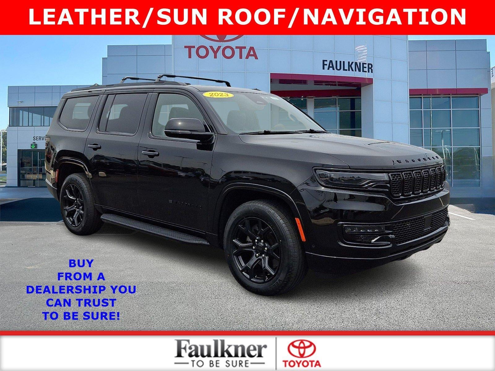 2023 Jeep Wagoneer Series II Carbide 4x4 in Diamond Black Crystal Pearlcoat — front three-quarter view