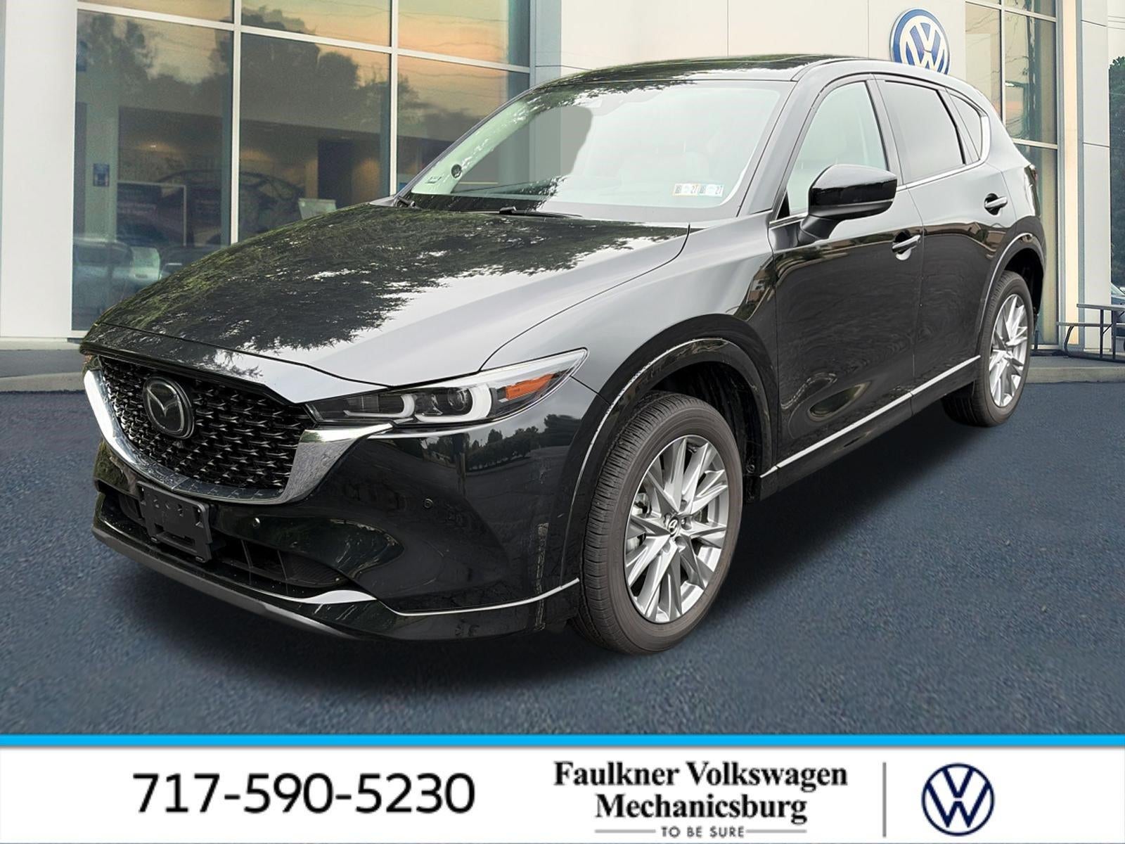 2025 Mazda Mazda CX-5 2.5 S Premium Plus Package AWD in Jet Black Mica — front three-quarter view