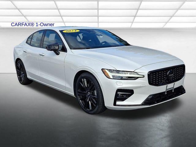 2024 Volvo S60 B5 AWD Plus Black Edition in Crystal White Metallic — front three-quarter view