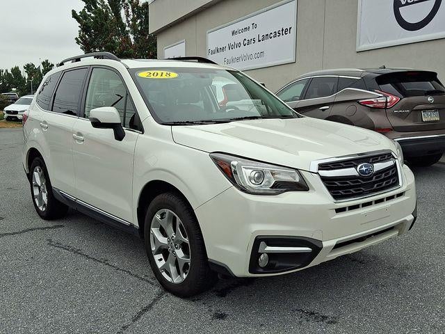 2018 Subaru Forester 2.5i Touring CVT in Crystal White Pearl — front three-quarter view