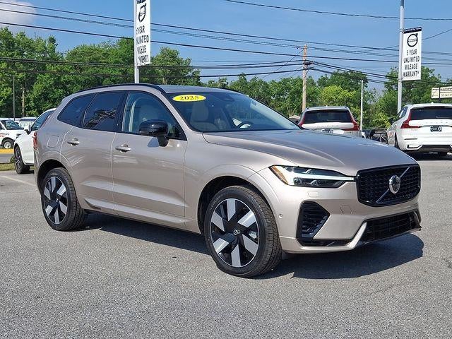 2025 Volvo XC60 Plug-In Hybrid T8 AWD Plus in Bright Dusk Metallic — front three-quarter view