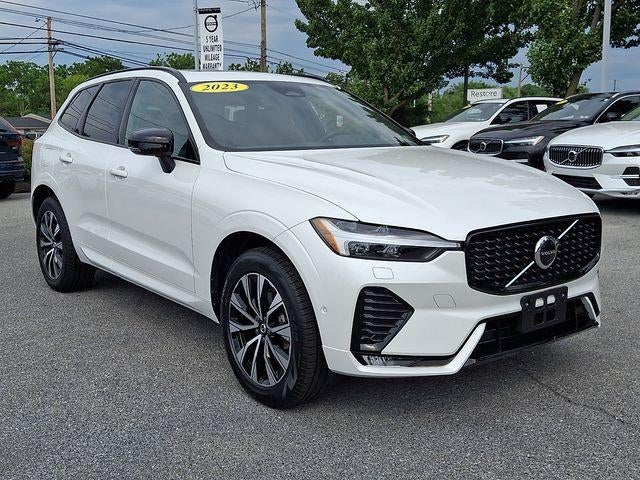 2023 Volvo XC60 B5 AWD Plus Dark Theme in Crystal White Metallic — front three-quarter view