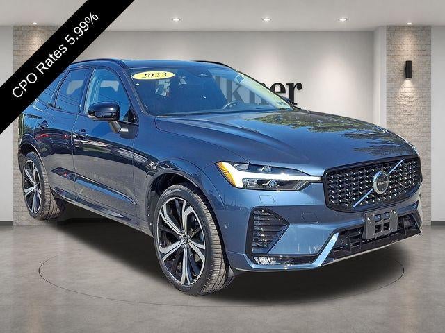 2023 Volvo XC60 B5 AWD Ultimate Dark Theme in Denim Blue Metallic — front three-quarter view