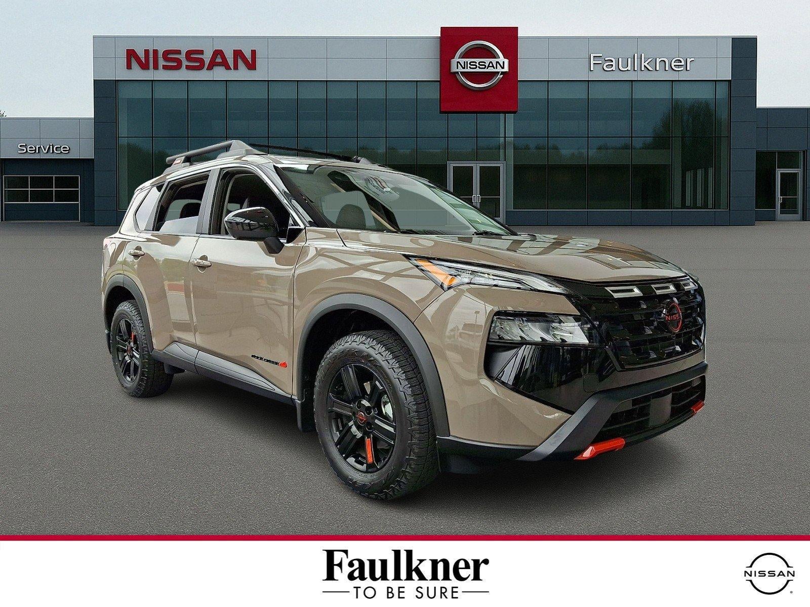 2026 Nissan Rogue Rock Creek in Baja Storm Metallic — front three-quarter view