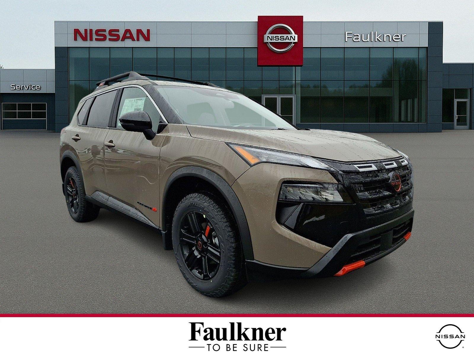 2026 Nissan Rogue Rock Creek in Baja Storm Metallic — front three-quarter view