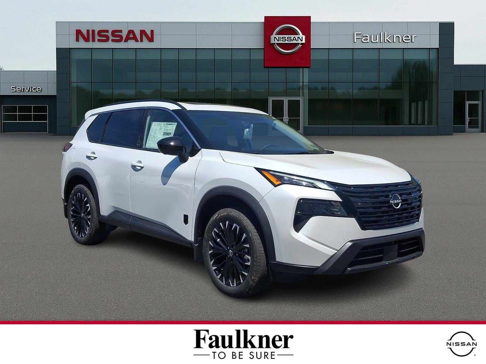 2026 Nissan Rogue Dark Armor in Everest White Pearl Tricoat — front three-quarter view