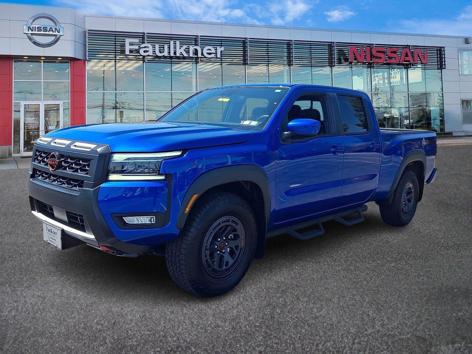 2025 Nissan Frontier — rear three-quarter view