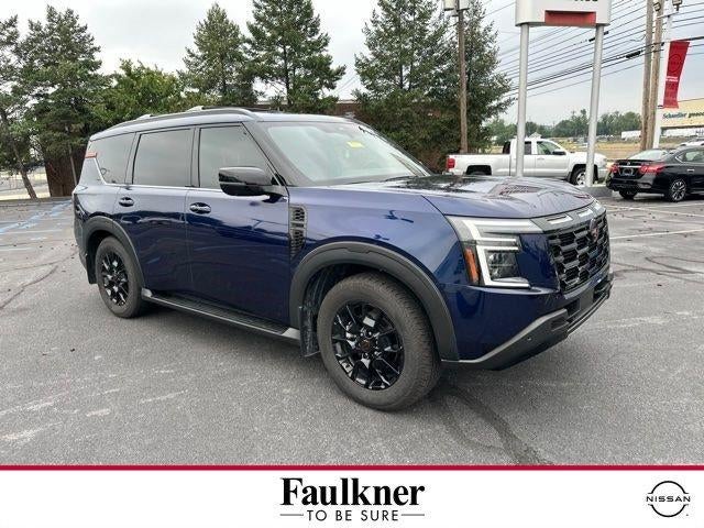 2025 Nissan Armada PRO-4X in Deep Ocean Blue Pearl — front three-quarter view