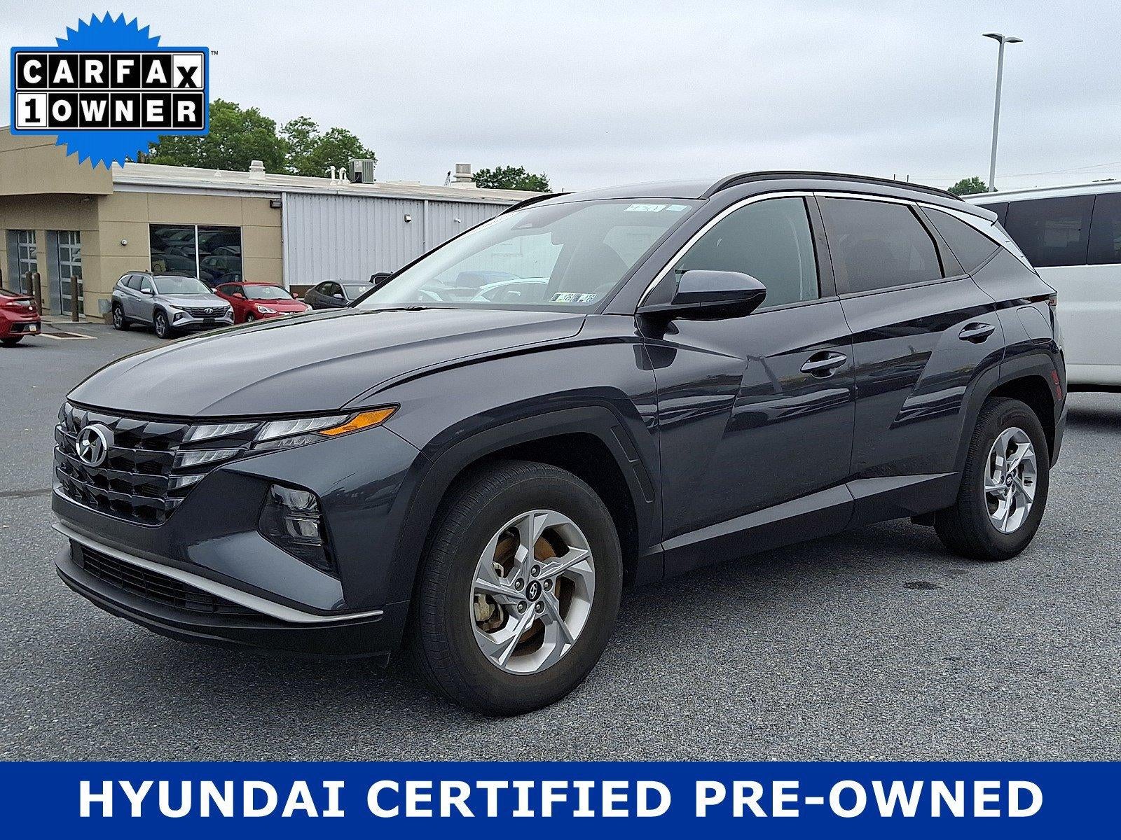2024 Hyundai TUCSON SEL in Dark Gray Metallic — front three-quarter view